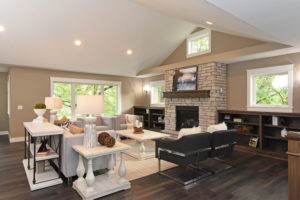 Spacious family room with gas fireplace and custom built-ins