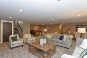 Basement living room ready to entertain friends and family