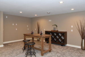Basement with warm brown tones and white trim